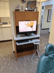 desktop monitor at dentist office - dentistry data storage and protection